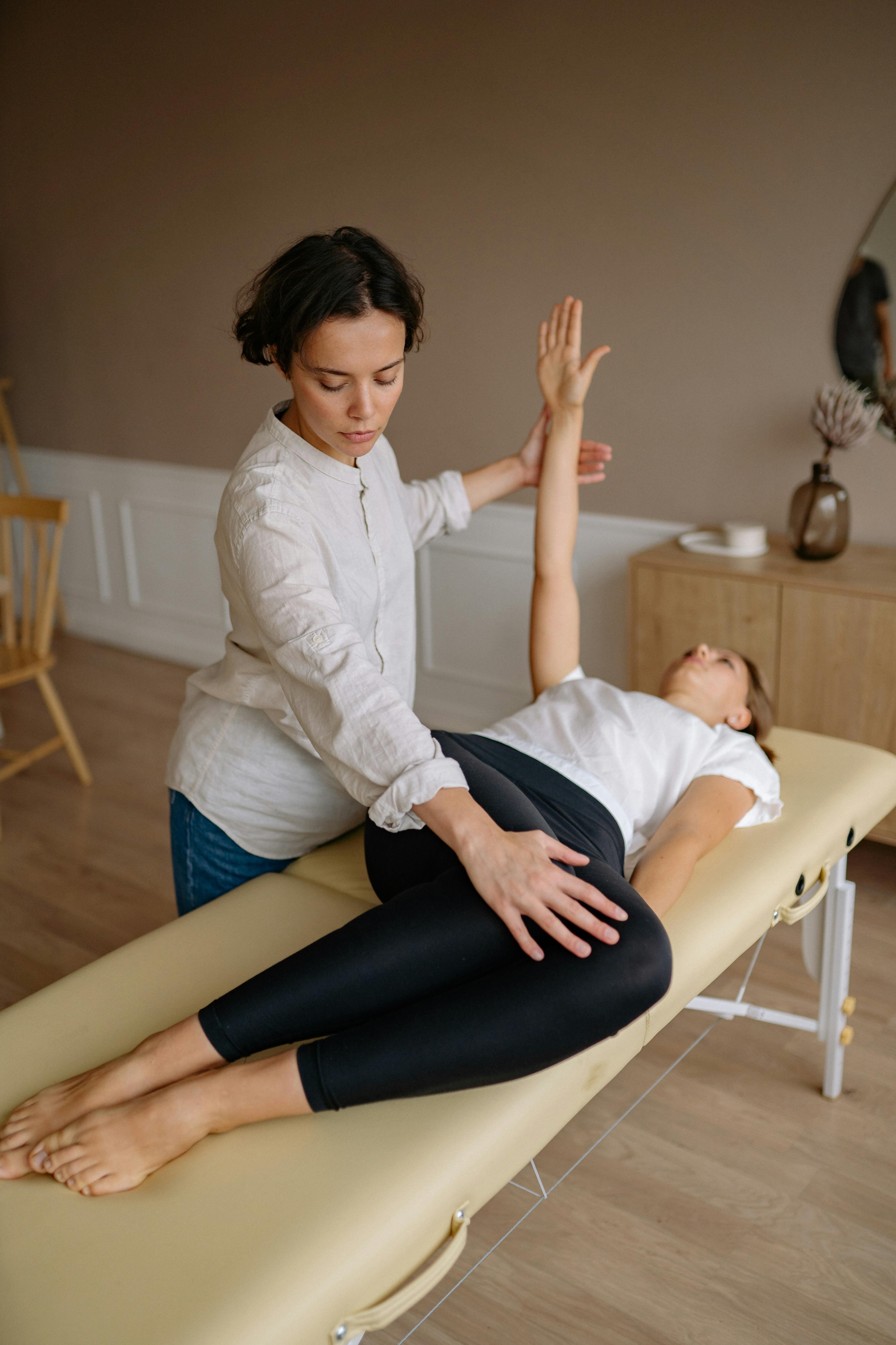 Physiotherapist working with a patient